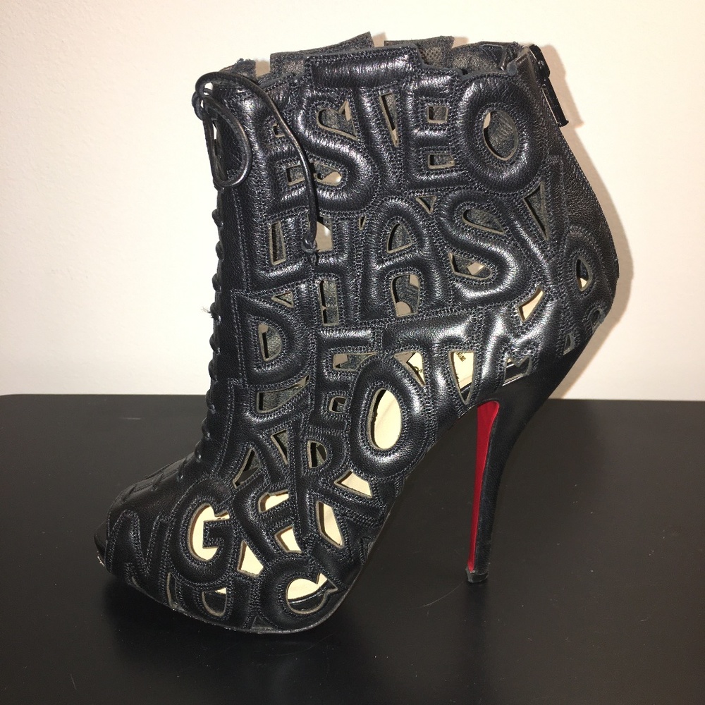 CHRISTIAN LOUBOUTIN BLACK LASER CUT LEATHER BOOTIE